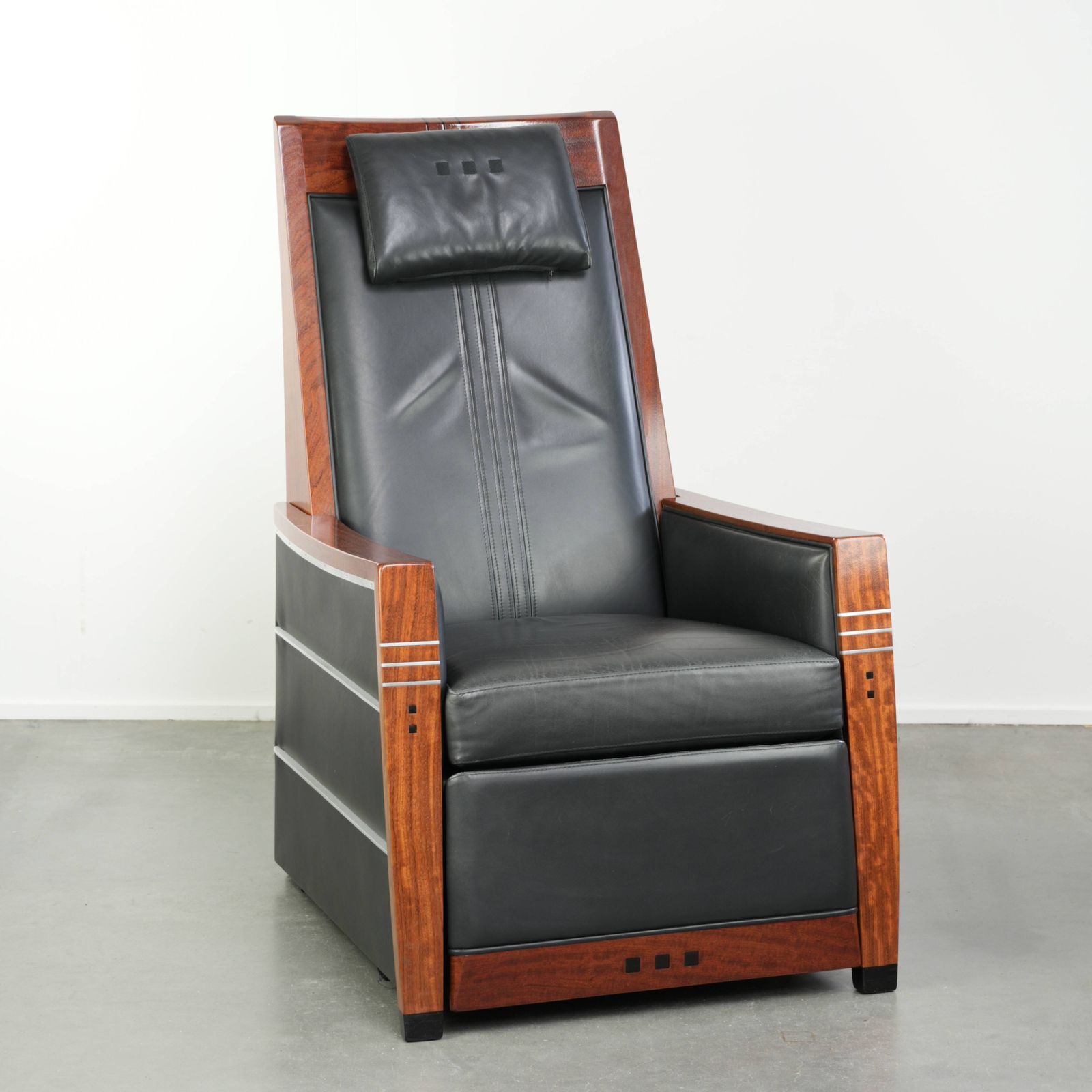 Luxury Electrically Adjustable Art Deco Design Recliner With Black Cow Leather.