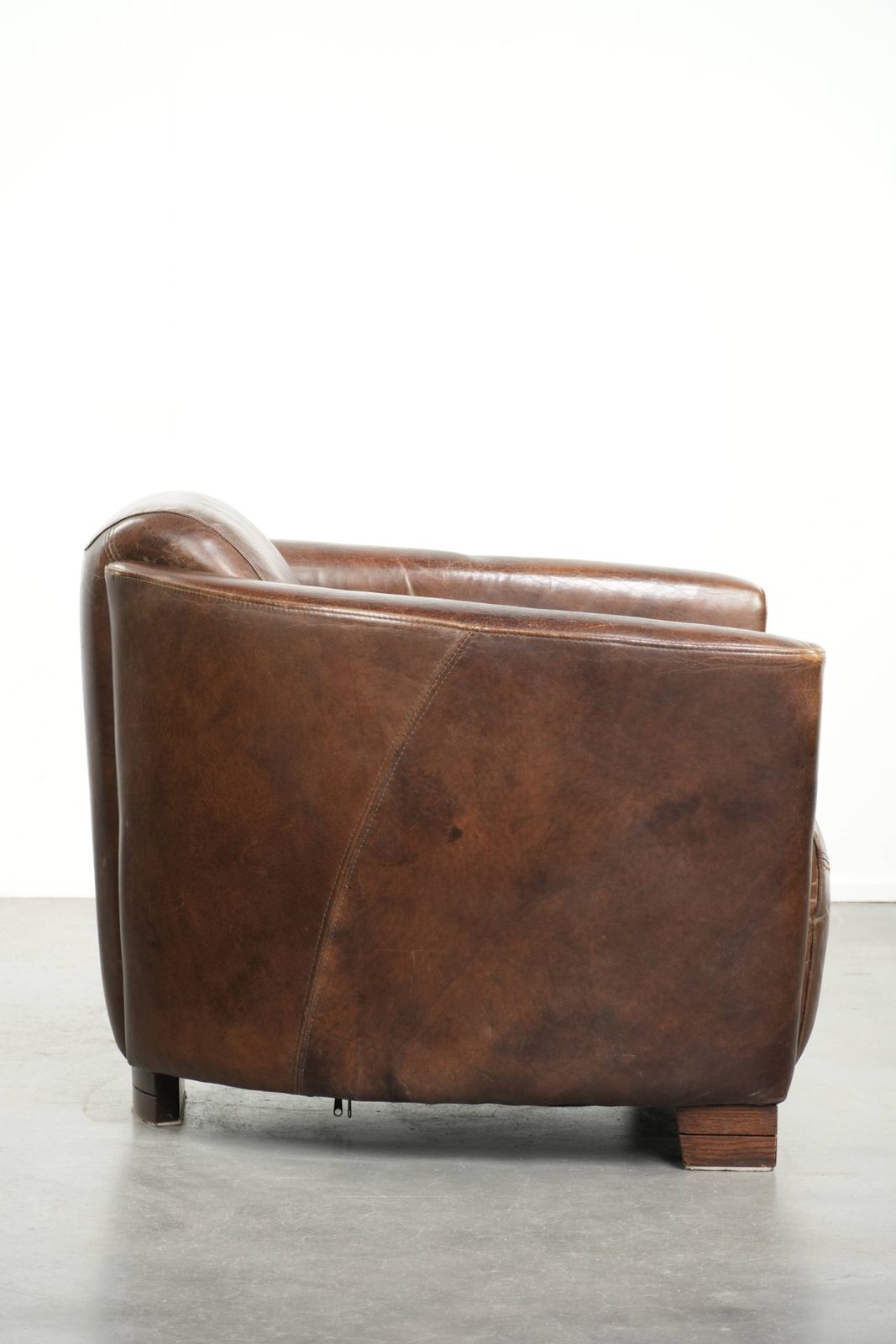Characterful And Robust Dark Cognac Brown Cowhide Leather Aviator Design Armchair With An Interesting Shape photo for sale