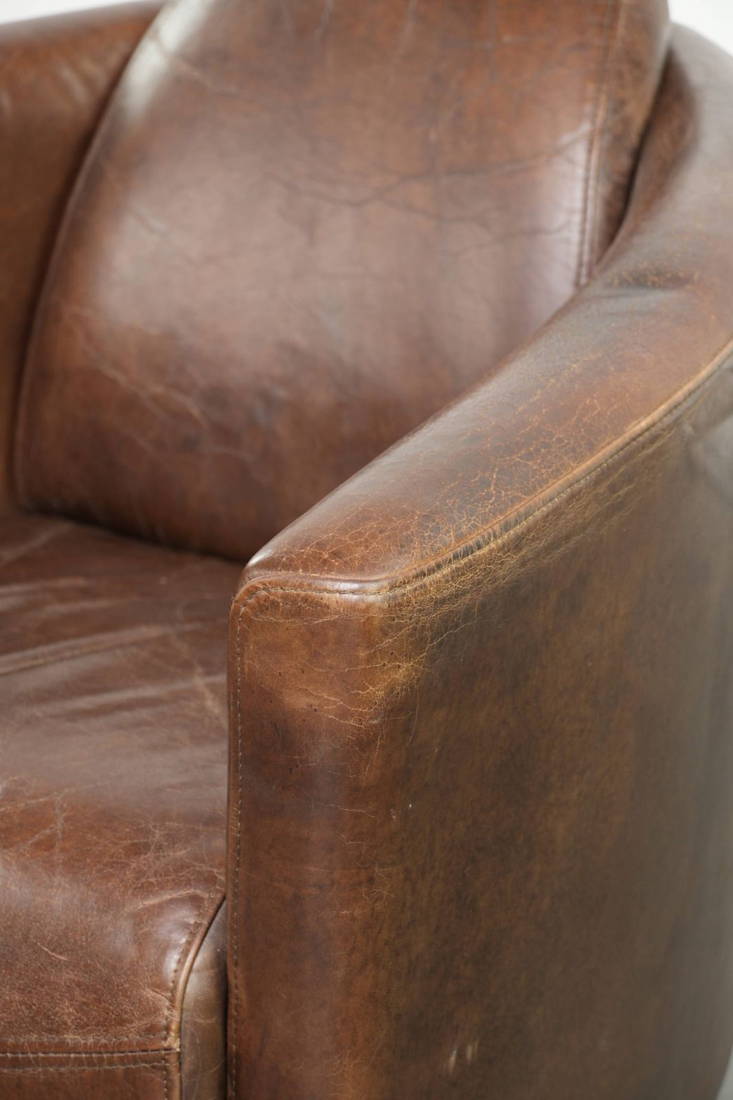 photo for sale Characterful And Robust Dark Cognac Brown Cowhide Leather Aviator Design Armchair With An Interesting Shape