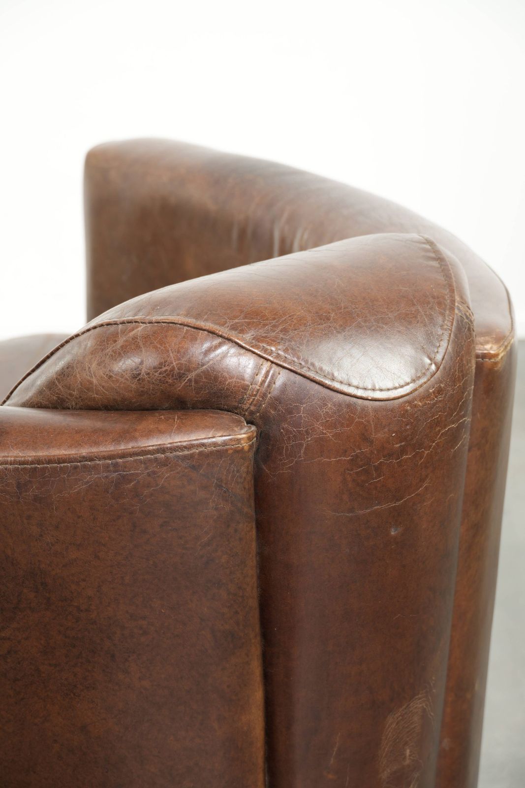 photo vinterior Characterful And Robust Dark Cognac Brown Cowhide Leather Aviator Design Armchair With An Interesting Shape