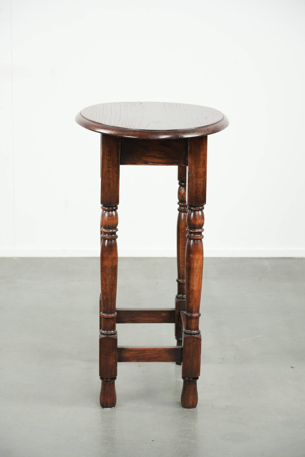 Antique Oval English Oak Side Table From The Early 20th Century With Beautiful Colors photo for sale
