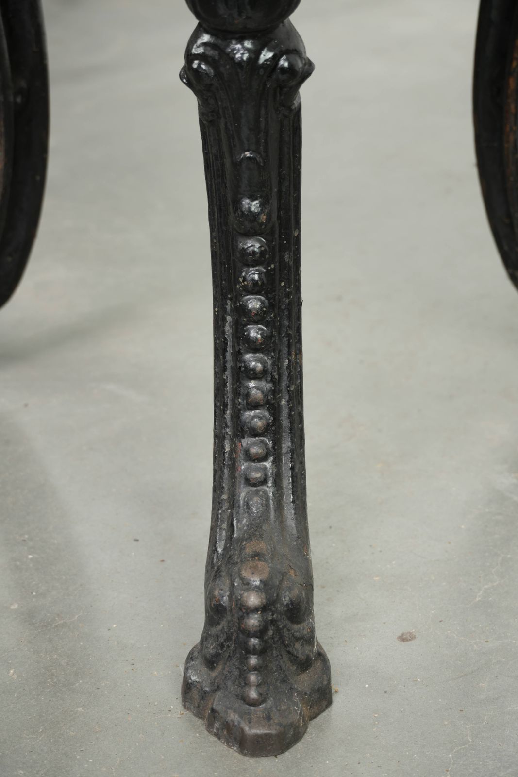 photo for sale Antique English Bistro/Side Table With A Cast Iron Base From The Early 20th Century And A Solid Wood Tabletop.