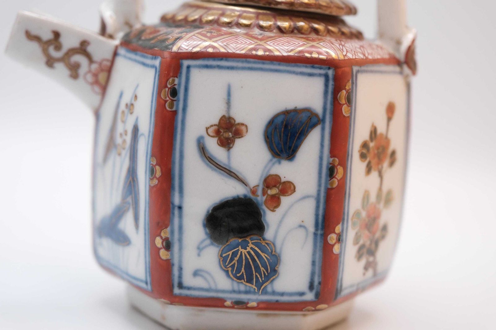 Antique Japanese Imari Porcelain Teapot, Hexagonal Form In The Arita Export Tradition, With A Fixed Overhead Porcelain Handle. photo furniture