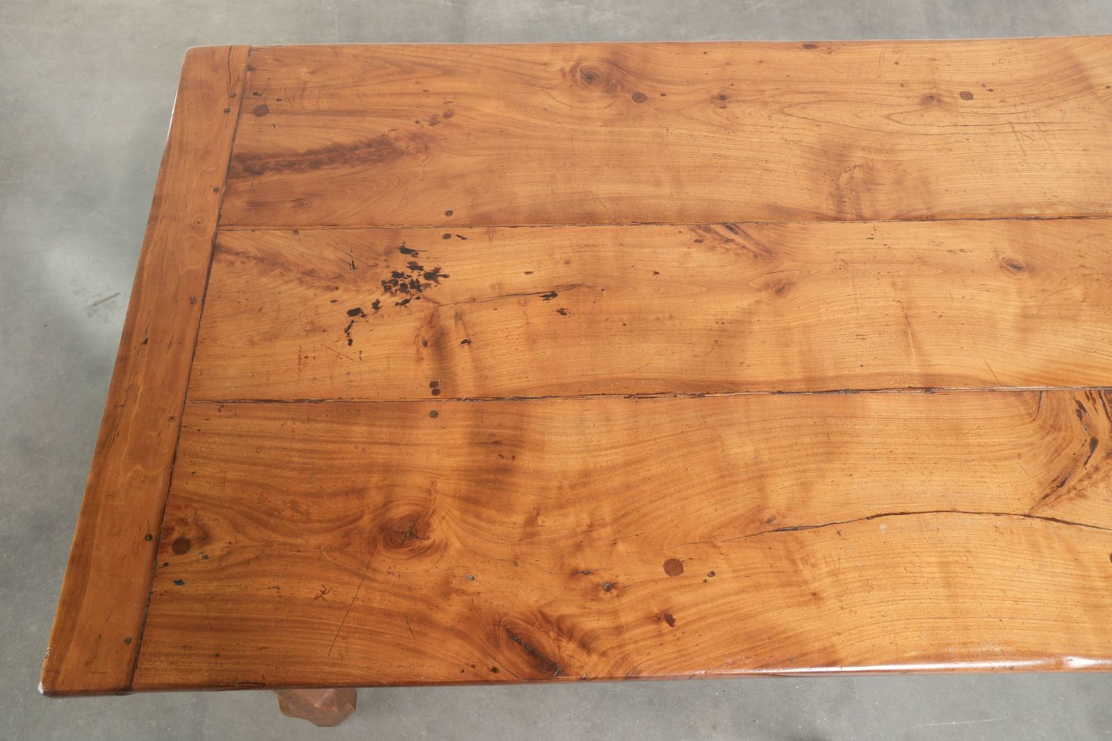 1867.0 Characterful Antique French Dining Table From The 18th Century With A Fruitwood Top And An Oak Base. photo