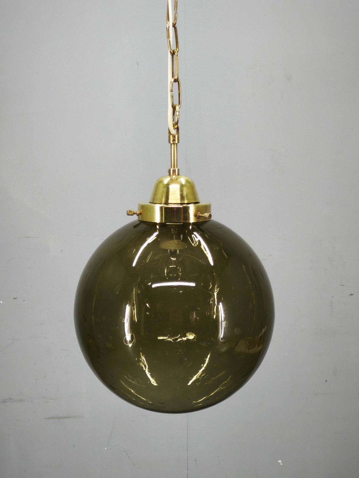 photo for sale Tsjechische hanglamp met gerookt glazen bol en messing, jaren 1970