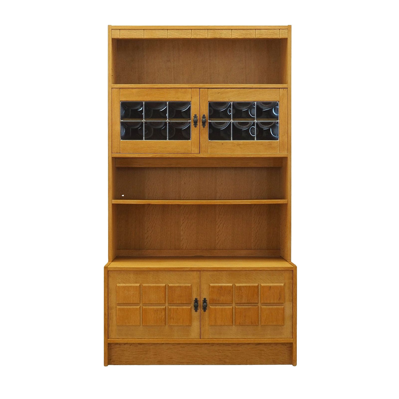 Bibliothèque danoise Henning Kjærnulf en chêne, portes vitrées et panneaux géométriques, années 1960