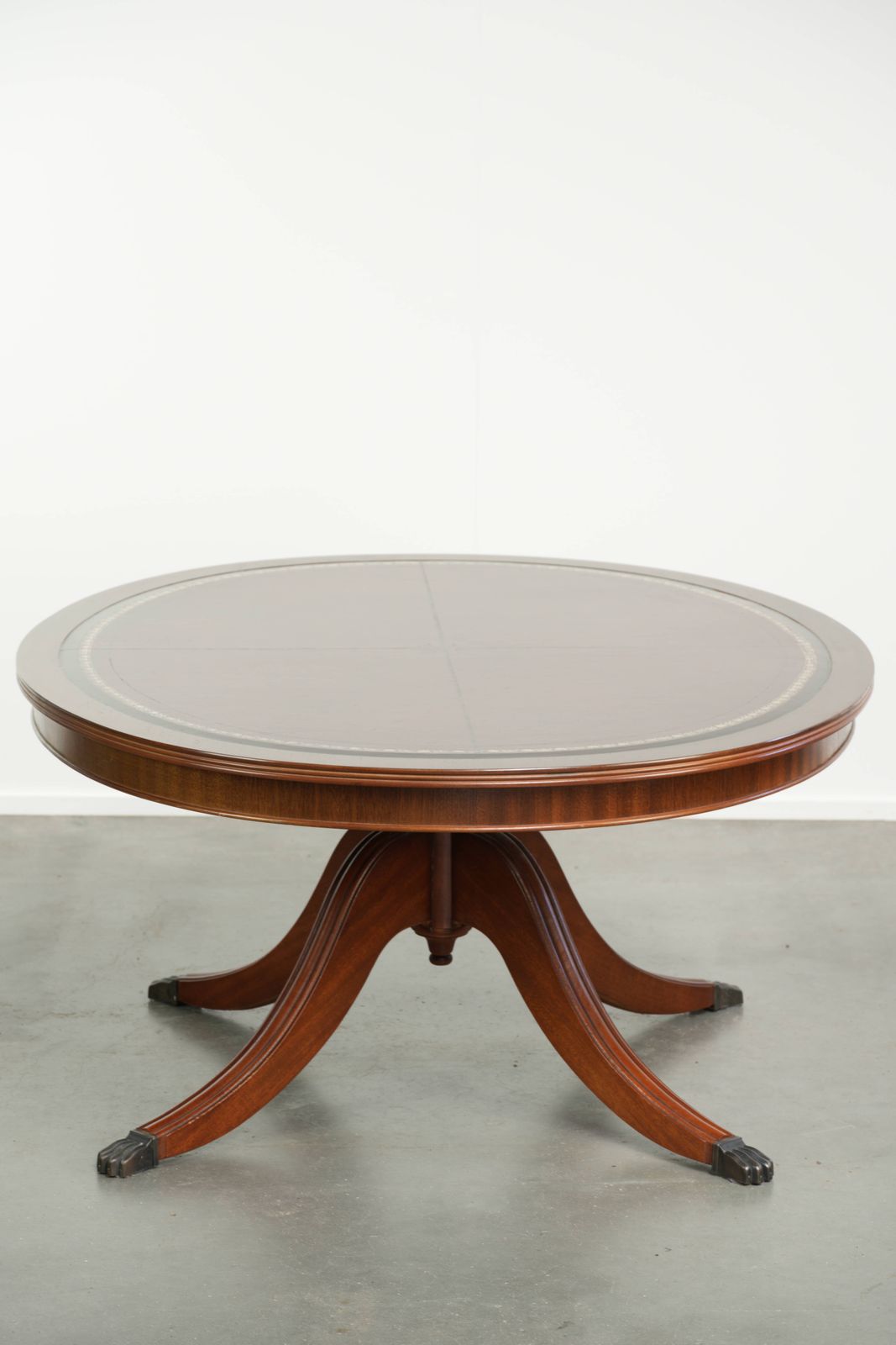 Elegant Oval Coffee Table With A Red Leather Top In English Style With Beautiful Details From The 20th Century photo 598.0
