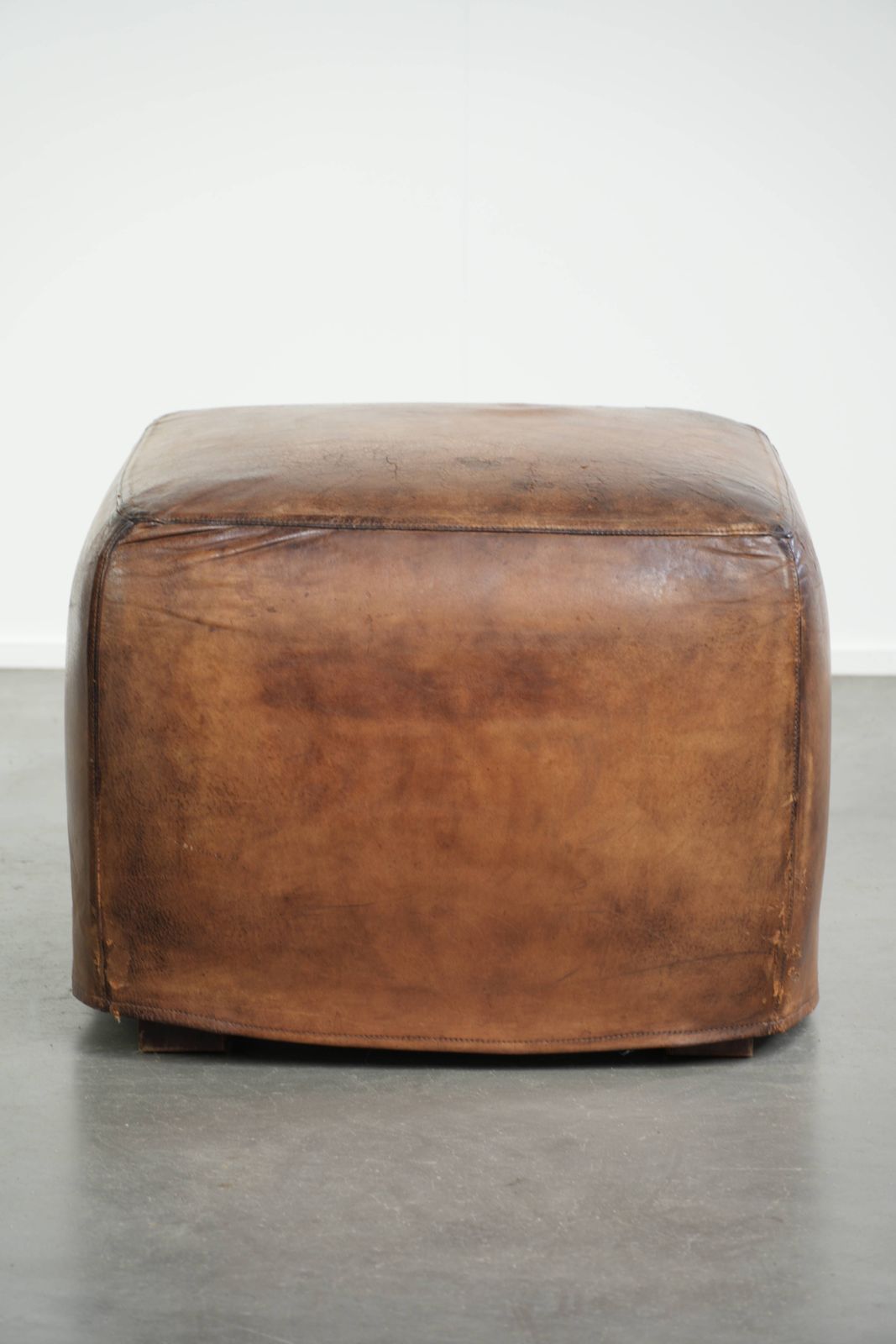 Unique And Large Sheepskin Designer Ottoman/Footstool With A Very Beautiful Patina And Stunning Colors photo for sale
