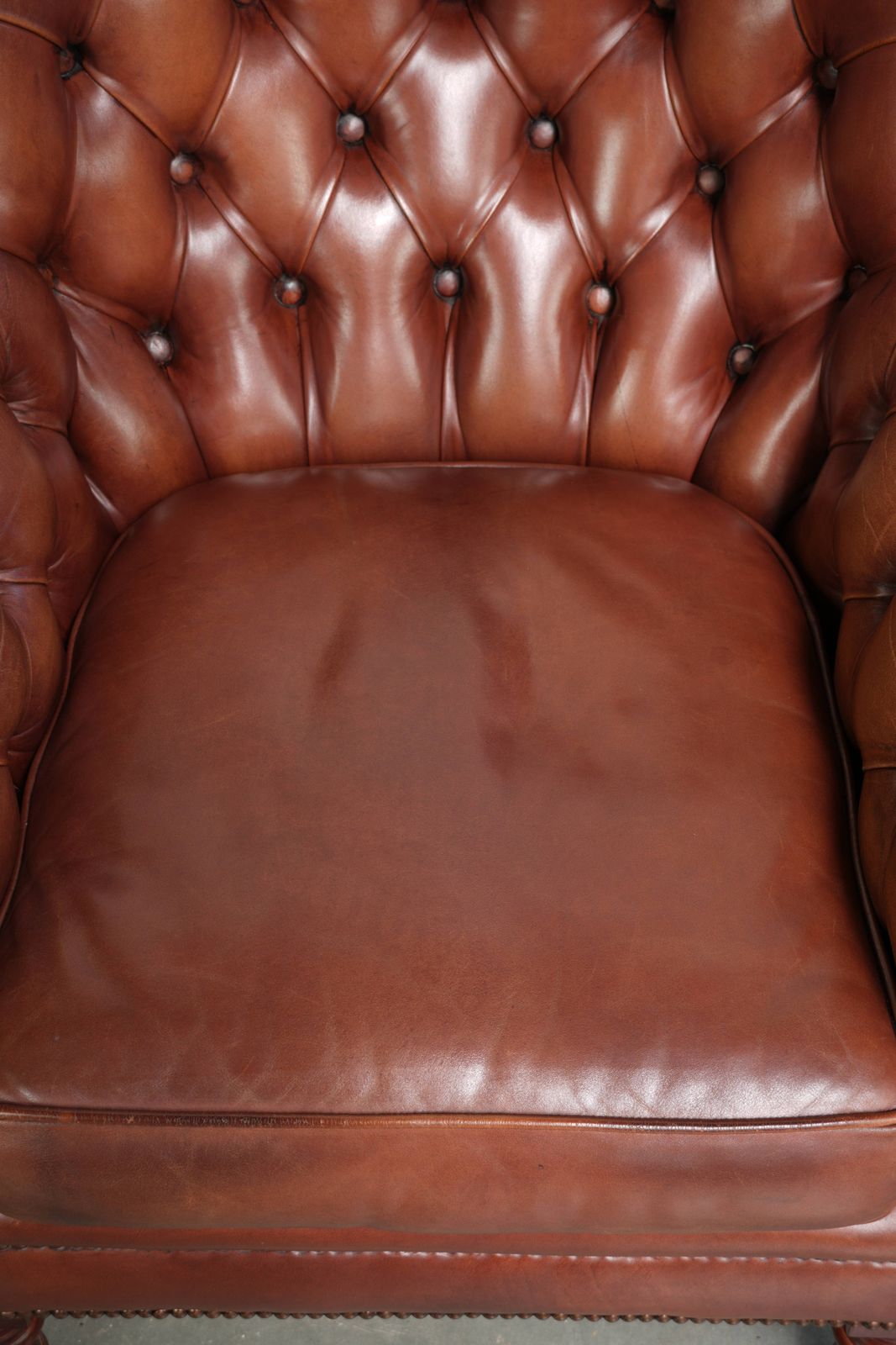 Very High Quality Cognac Colored Cowhide Chesterfield Armchair In English Style With A Timeless Design photo vinterior