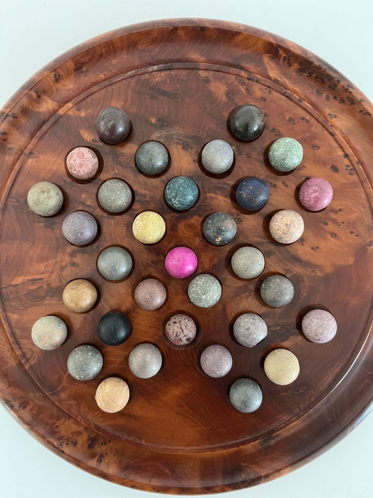 Marble Solitaire Board Game With 33 Handmade 19th Century Clay Or Stone Marbles. photo furniture