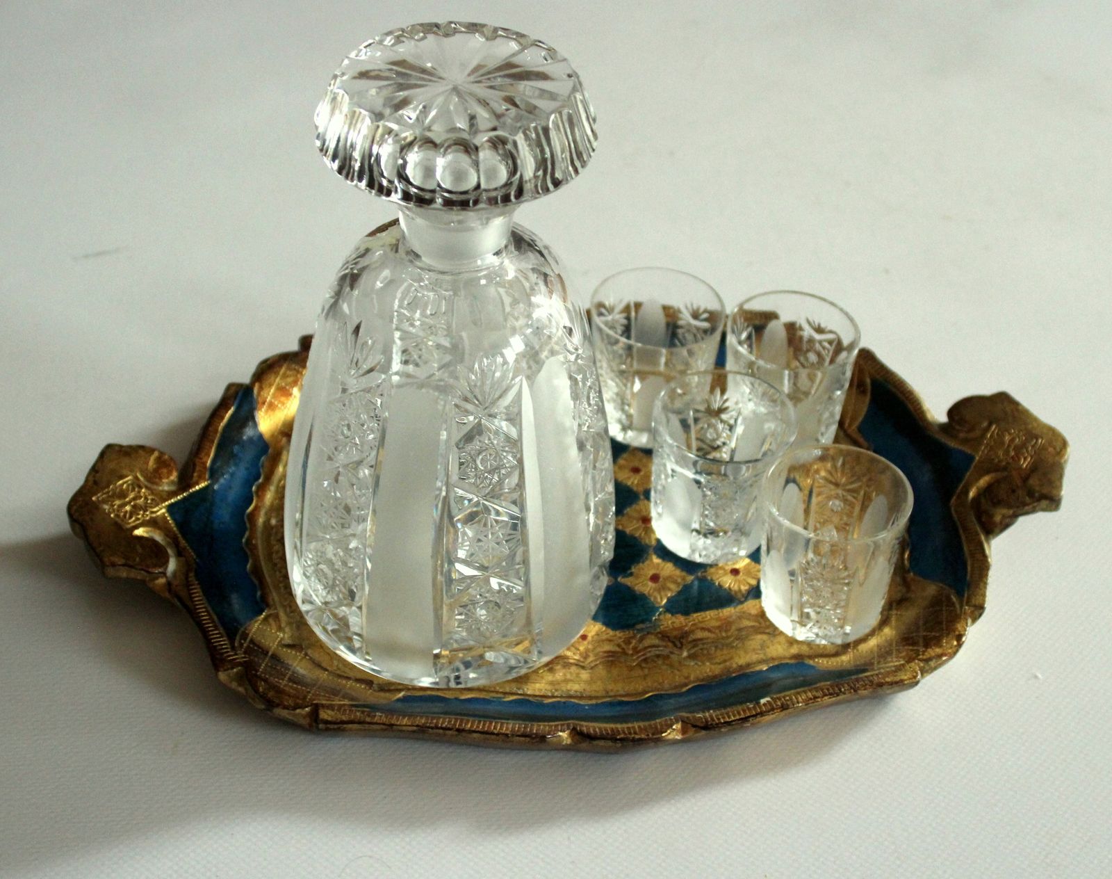 Set Of A Hand Cut Bohemian Lead Crystal Carafe And 5 Liqueur Glasses On A Wooden Florentine Tray   Vintage photo for sale