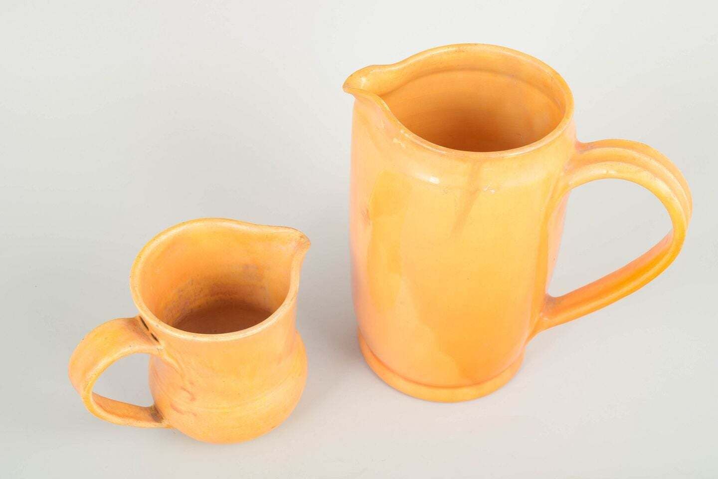 Kähler, Denmark. Two Large Ceramic Pitchers. Yellow Orange Glaze. 1930s photo furniture
