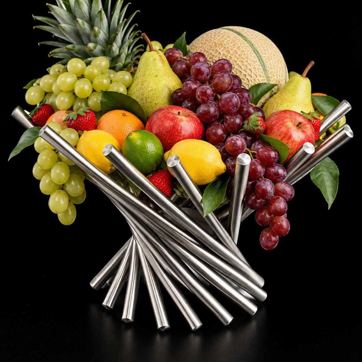 Moderne roestvrijstalen fruitschaal, industrieel middelpunt. photo 140.0
