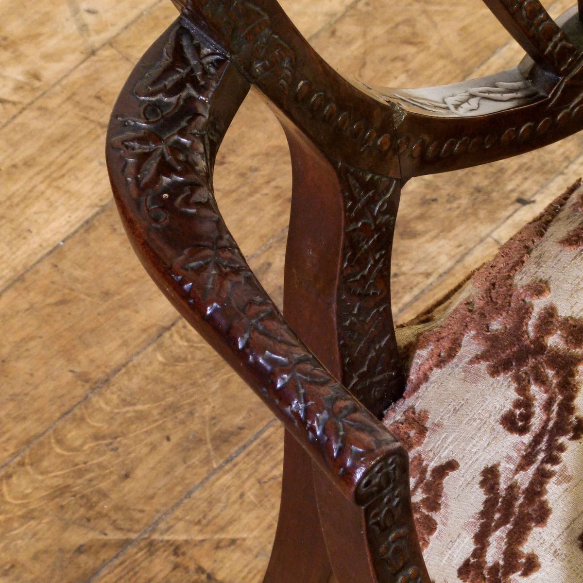 A Pair Of Edwardian Mahogany Armchairs In The Manner Of Hepplewhite. Profusely Carved With Foliage, Flowers, Ribbons And Swags. The Central Shield Bac photo vinterior