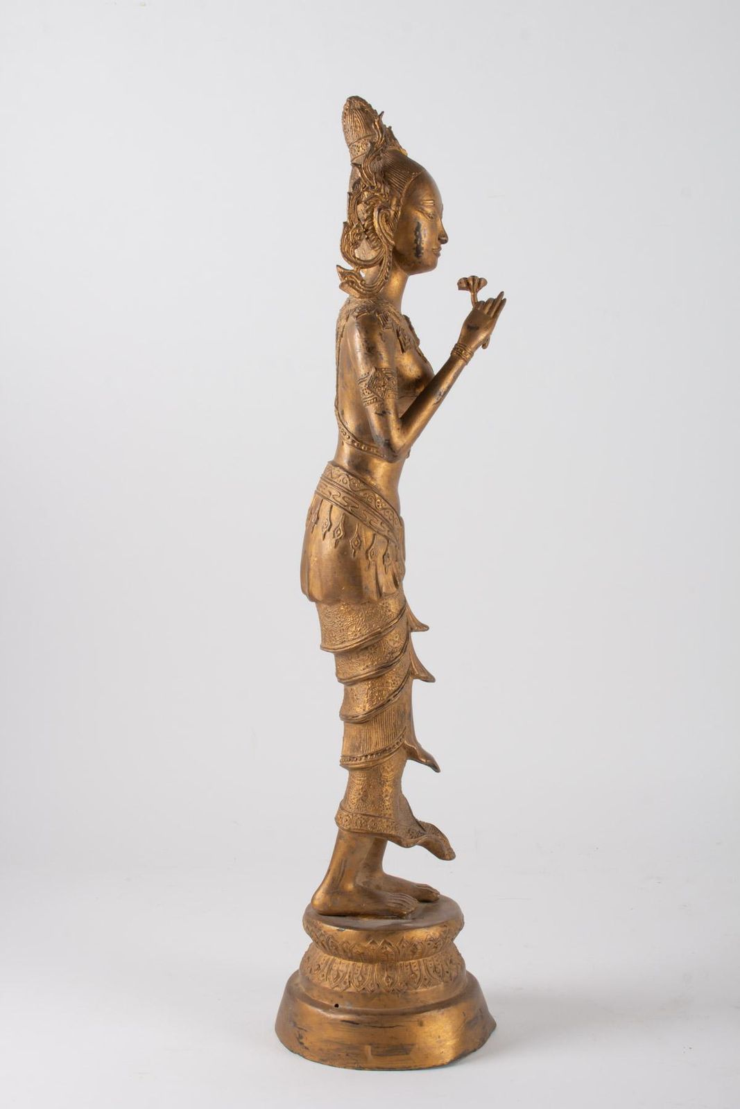 Indonesian Goddess In Gilded Metal Holding A Lotus Flower, 1920 1940 photo buy