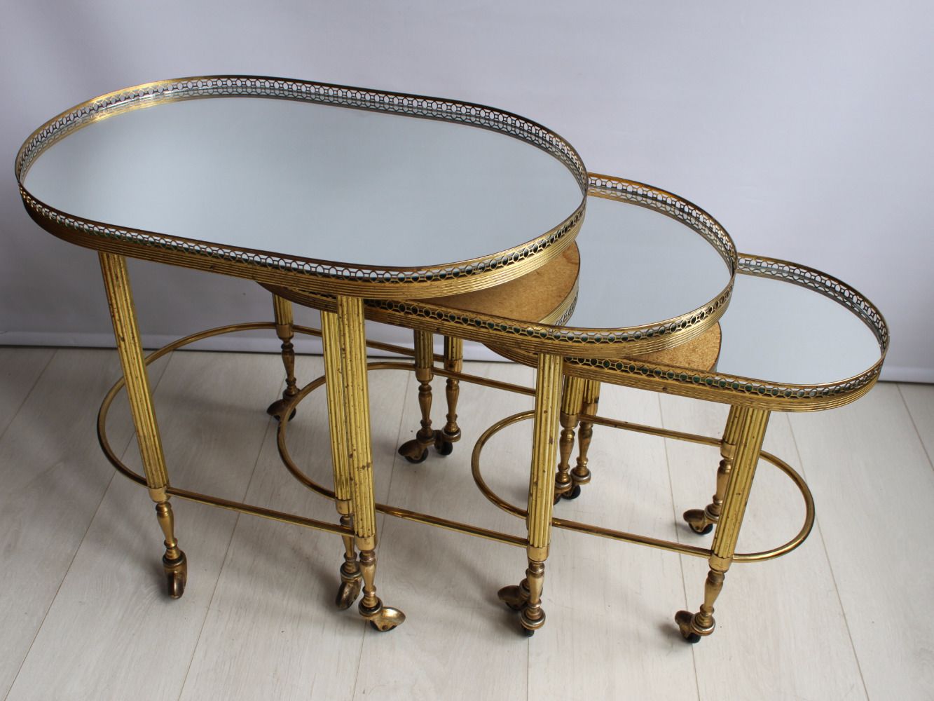 Nest Of Brass French Trolleys photo furniture