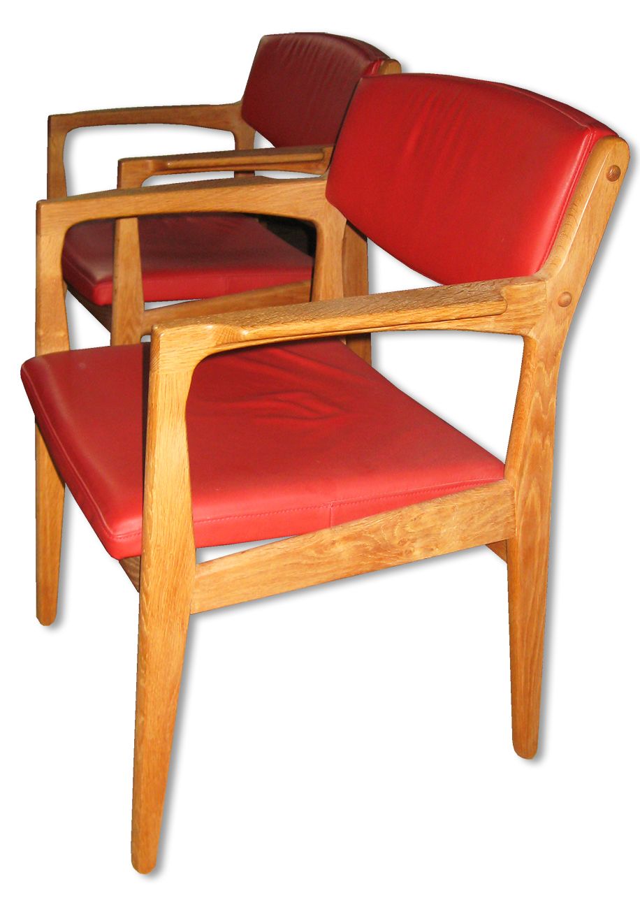 A Pair Of Armchairs Of Oak Upholstered In Red Leather photo furniture