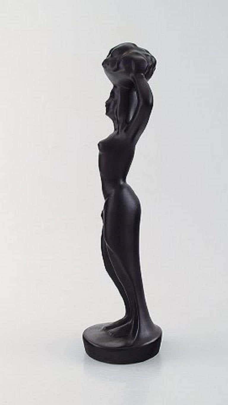 Scandinavian Ceramist, Sculpture In Black Glazed Ceramics, Woman Carrying Basket photo furniture