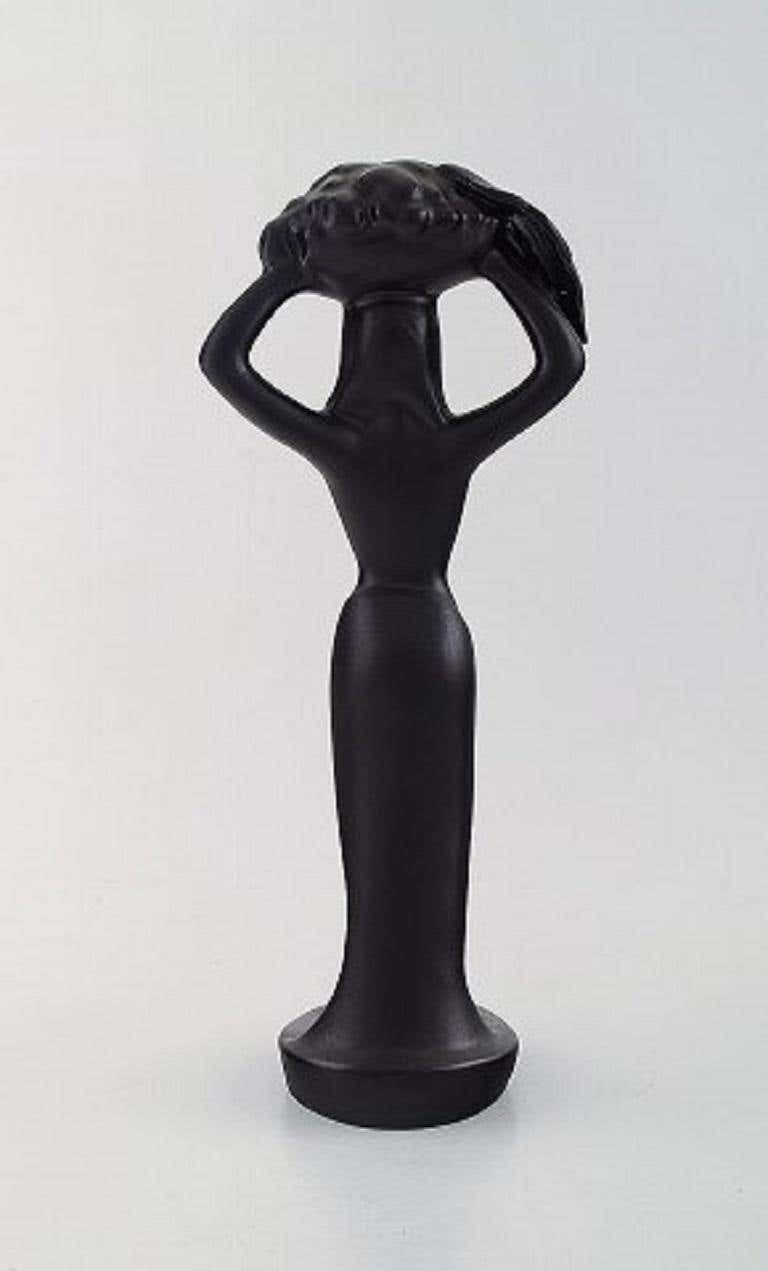 Scandinavian Ceramist, Sculpture In Black Glazed Ceramics, Woman Carrying Basket photo for sale
