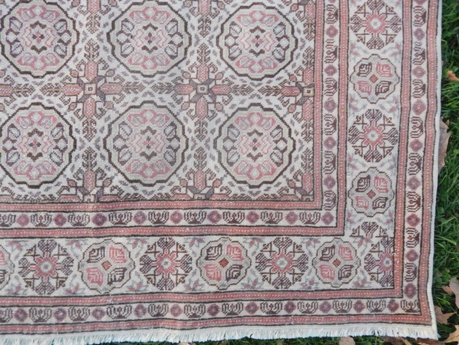 Vintage Turkse wollen en katoenen vloerkleed photo Textiel