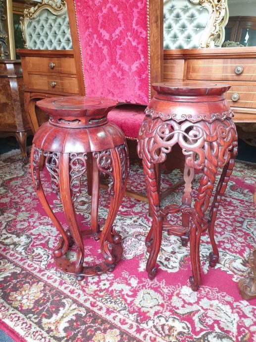 Two Carved Pillars / Stands