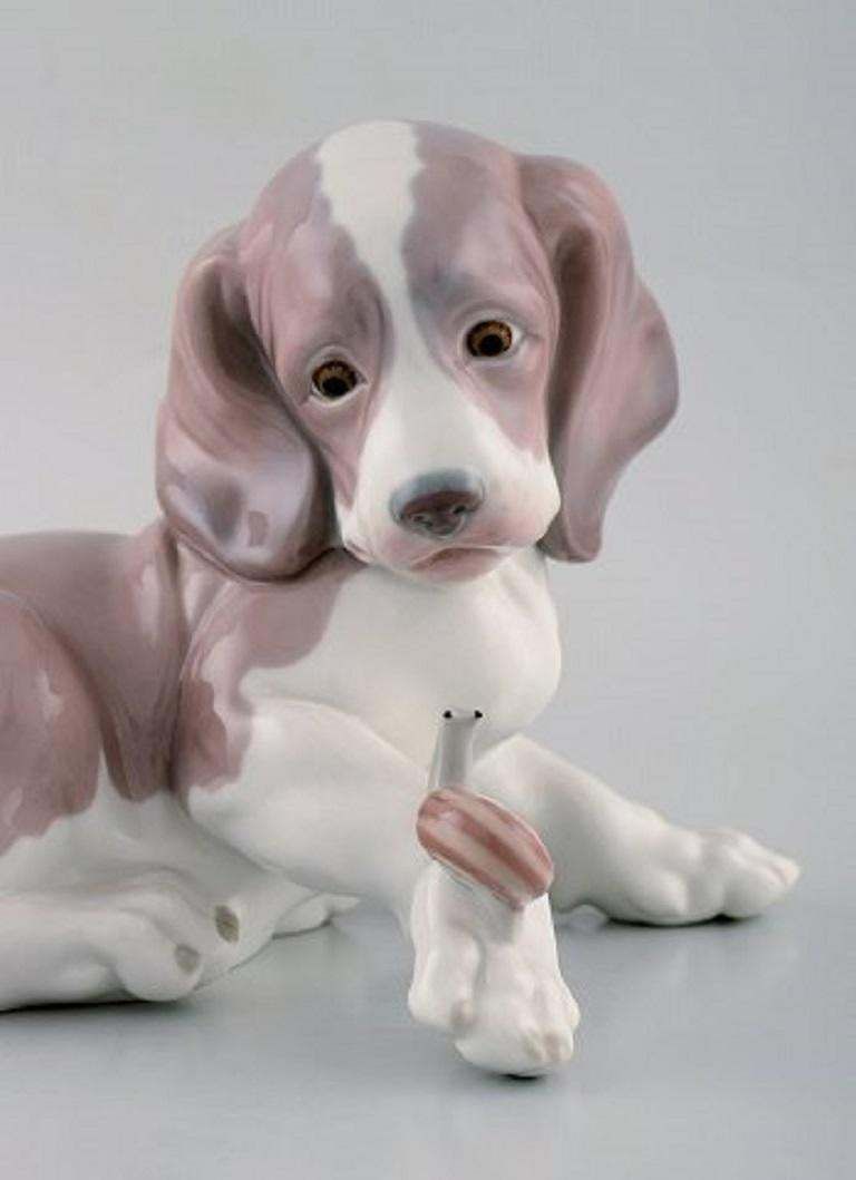 Lladro, Spain, Figure In Glazed Porcelain, Puppy And Snail, 1980s photo furniture