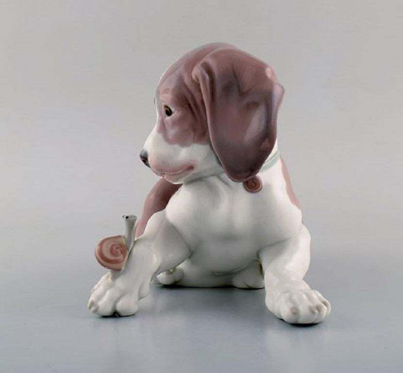 Lladro, Spain, Figure In Glazed Porcelain, Puppy And Snail, 1980s photo for sale