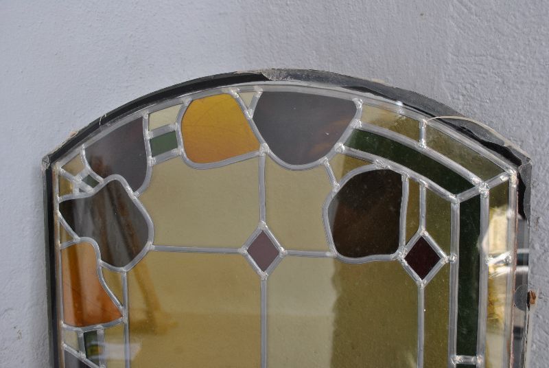 Stained Glass Window With Geometric Shapes Birds photo vinterior