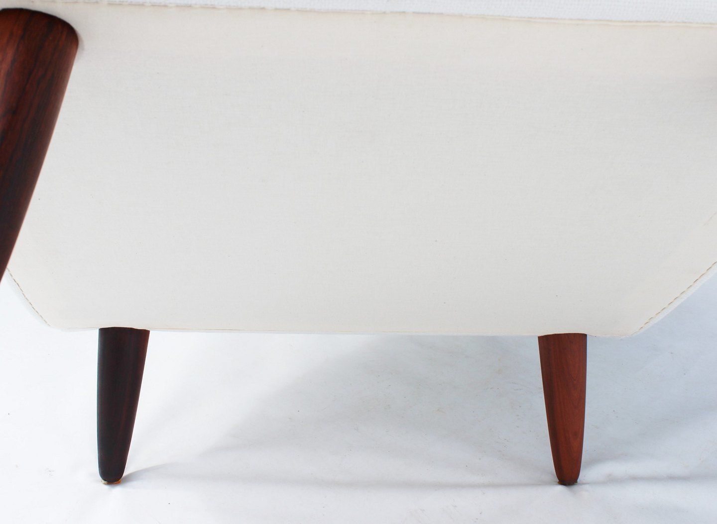 photo furniture Armchair With High Back, Upholstered In White Fabric, With Rosewood Of Danish Design From The 1960s