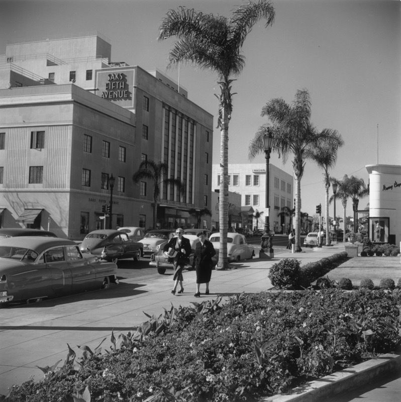 Slim Aarons 'Wilshire Boulevard' Silver Gelatin Print Framed In Black photo furniture