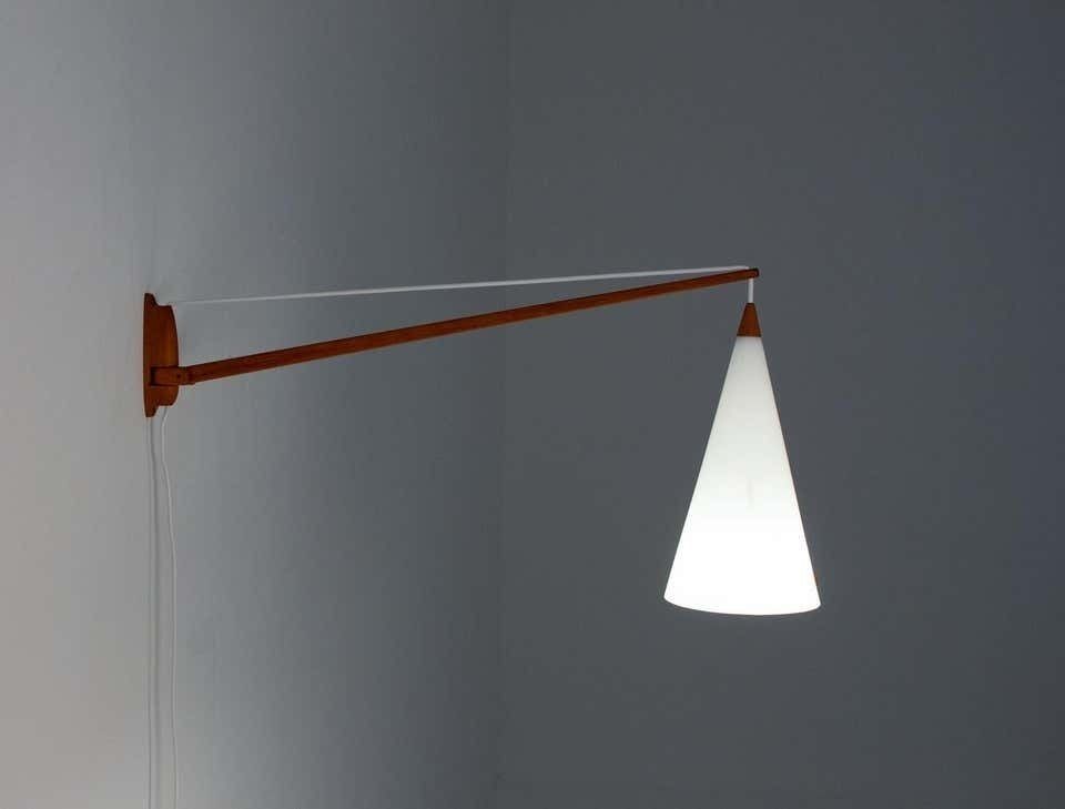 Swedish Midcentury Swiveling Wall Lamp In Acrylic And Teak By Luxus photo for sale