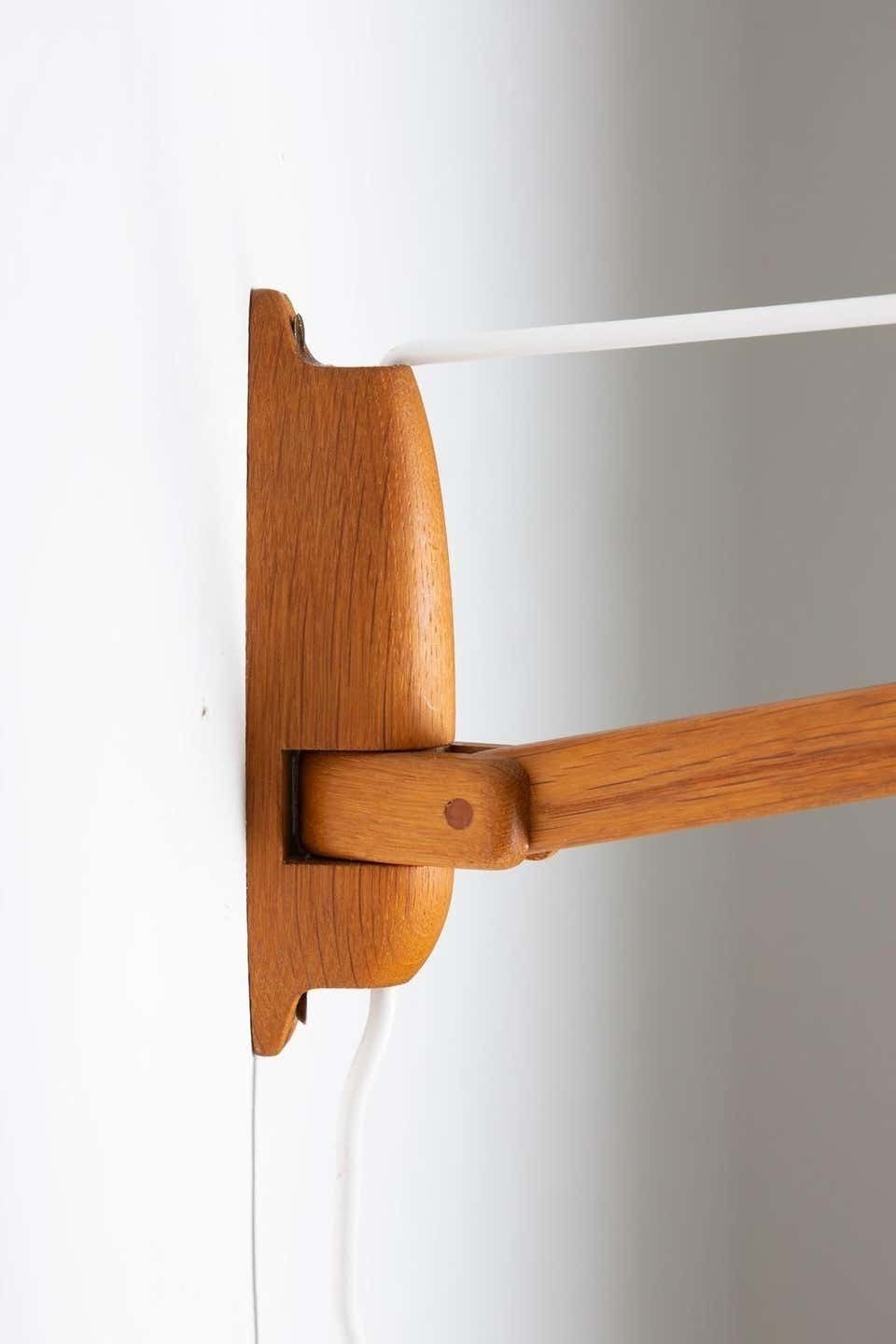 photo furniture Swedish Midcentury Swiveling Wall Lamp In Acrylic And Teak By Luxus
