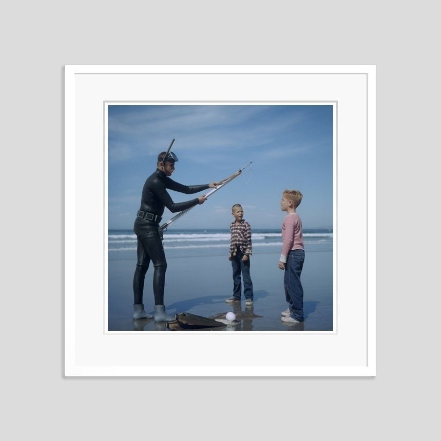 Slim Aarons 'Spear Fishing In San Diego' 1956 C Type Print Framed In White