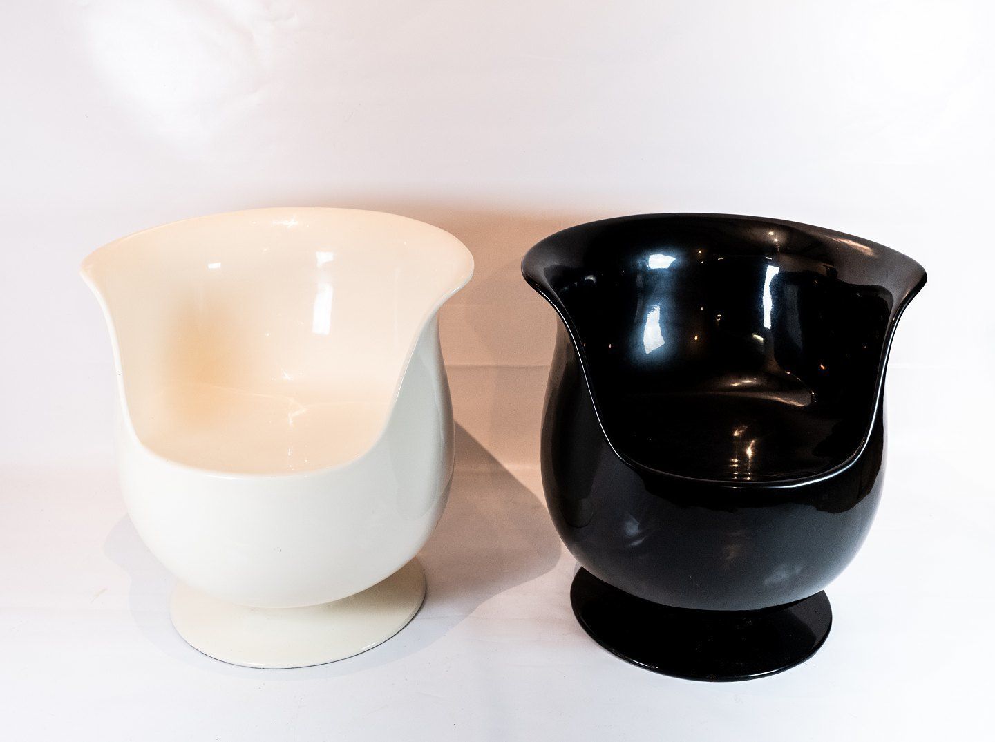 Chairs In The Form Of Teacups In White And Black Of Hard Plastic From The 1980s. photo furniture
