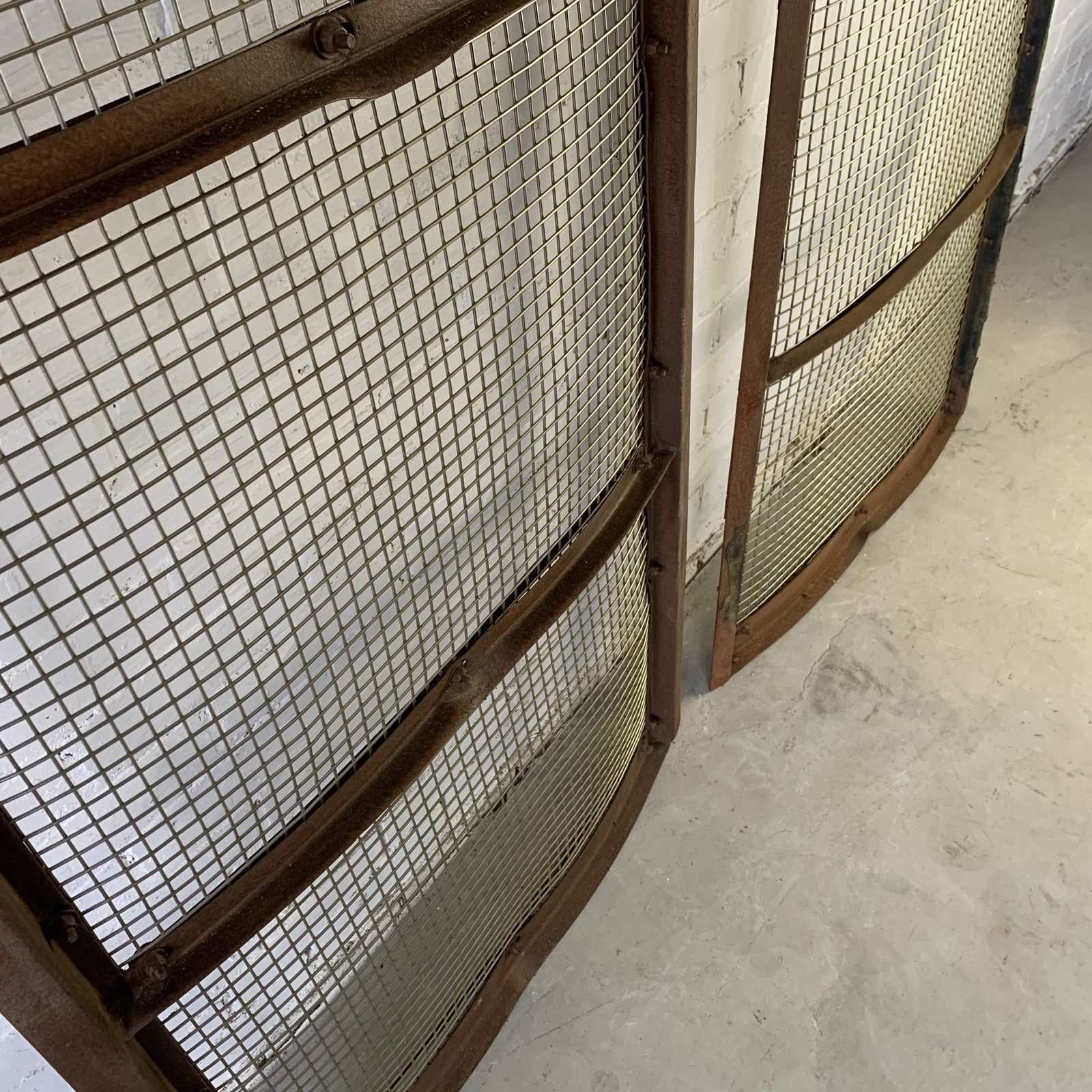 Pair Of Vintage Curved Steel Screens With Stainless Steel Grilles photo vinterior