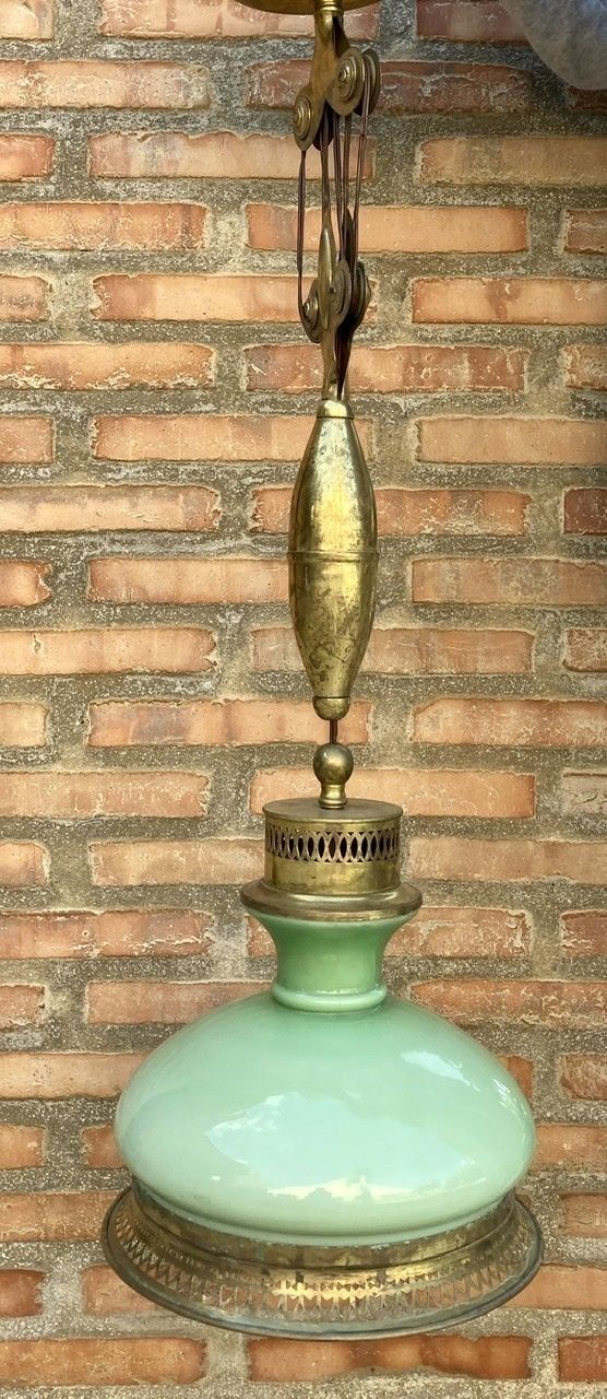 822.0 Mid Century Pulley Pendant Lamp With Opaline Green Crystal And Brass photo
