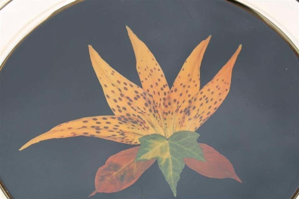 Round Tray In Golden Brass With Black Background And Real Leaves Made In Italy photo furniture