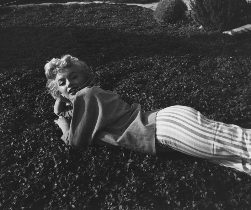 'Marilyn Monroe Relaxing On The Grass' Circa 1954 Silver Gelatin Print Framed In White photo furniture