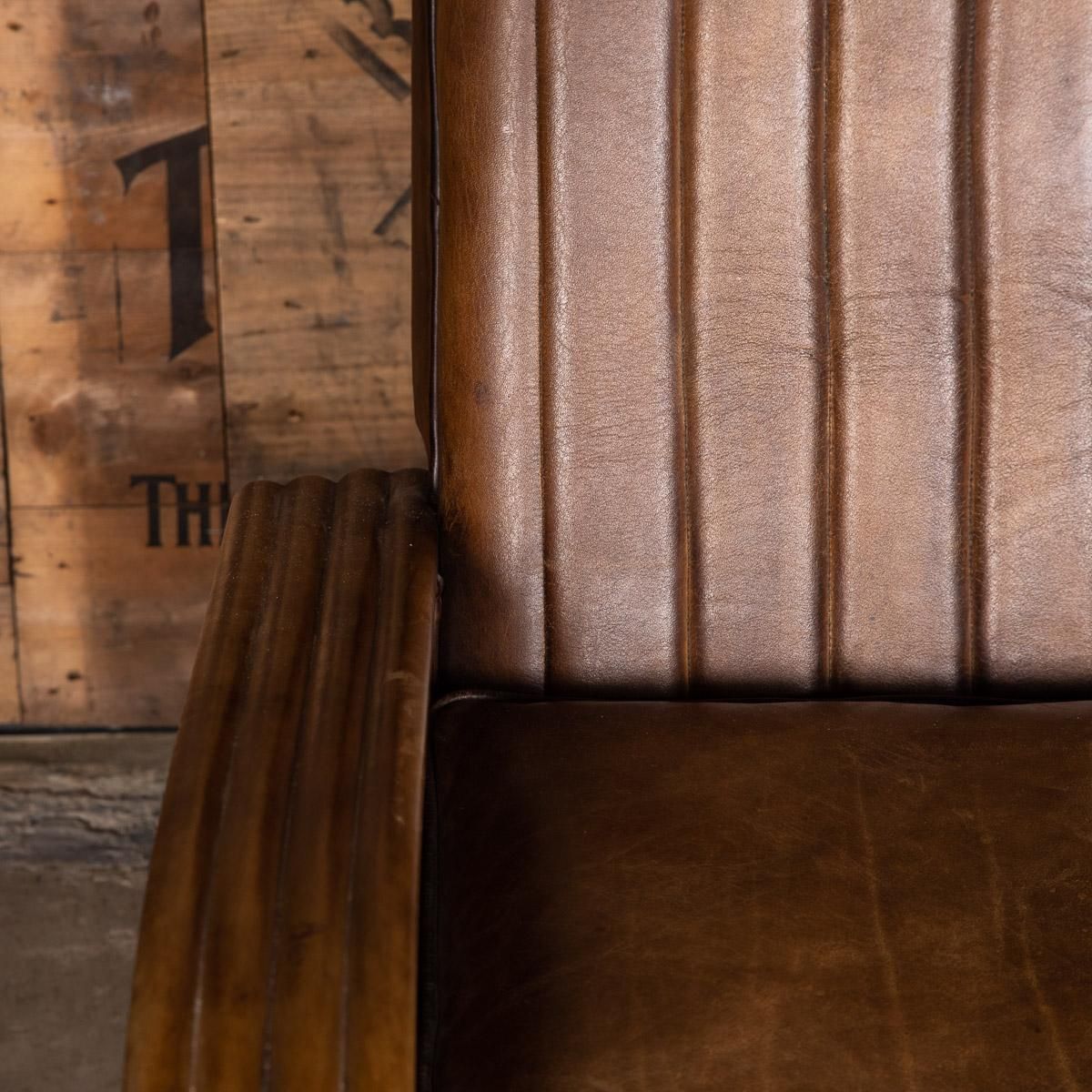 photo vintage 20th Century Art Deco Pair Of Leather Tub Chairs And Sofa, Circa 1920