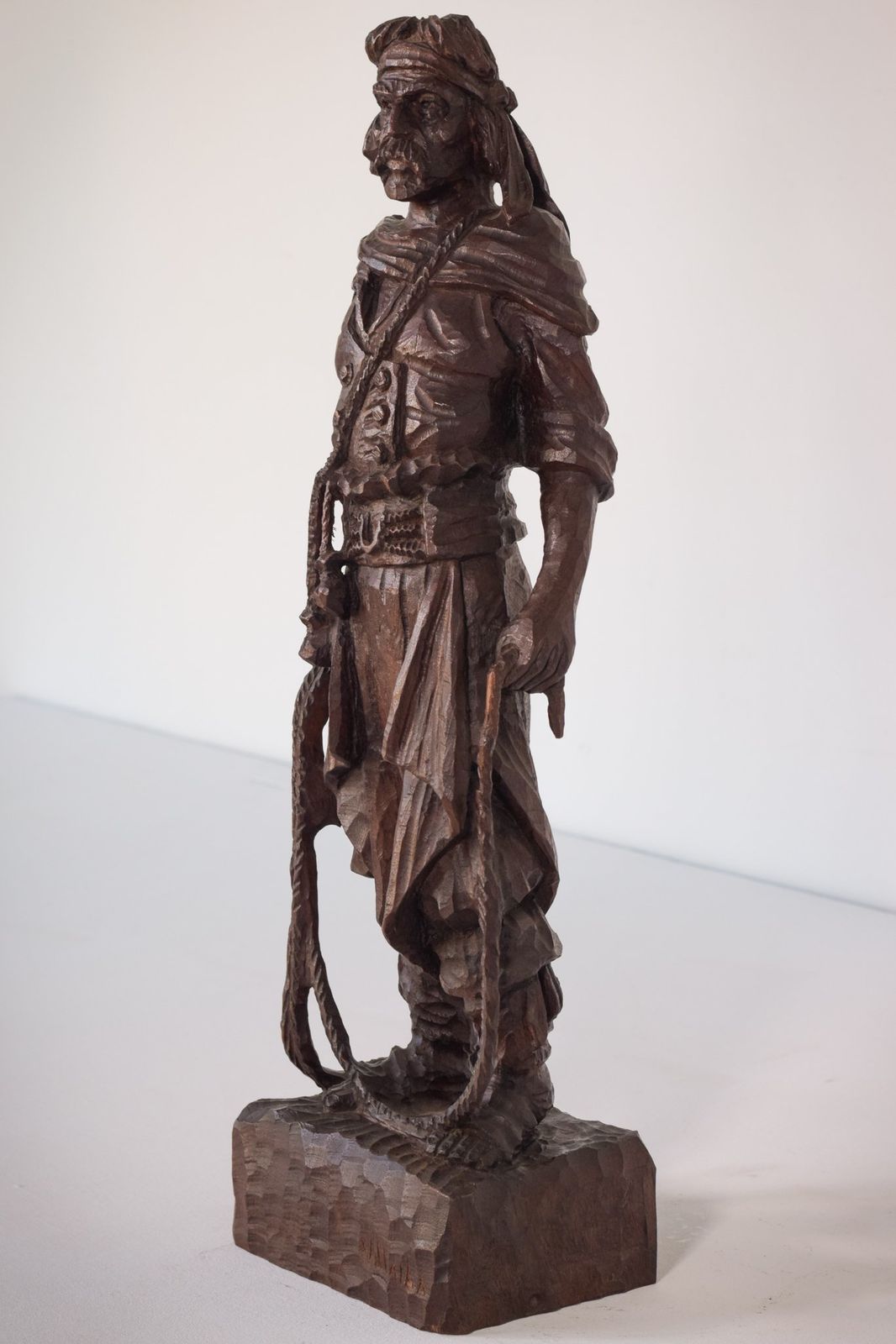 Hand Carved Wooden Sculpture Of A Male Figure photo for sale