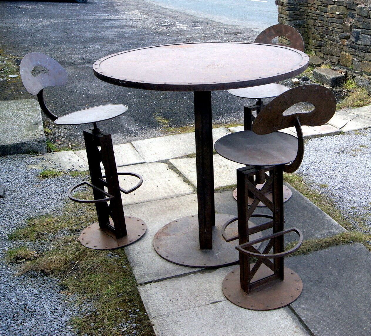 An Antique Industrial French Bistro Table And Chairs photo furniture