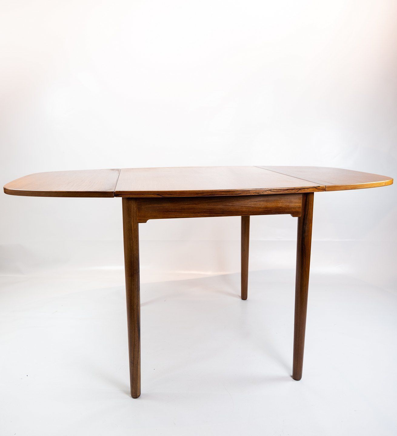 Small Dining Table In Rosewood With Extracts Of Danish Design From The 1960s. photo furniture