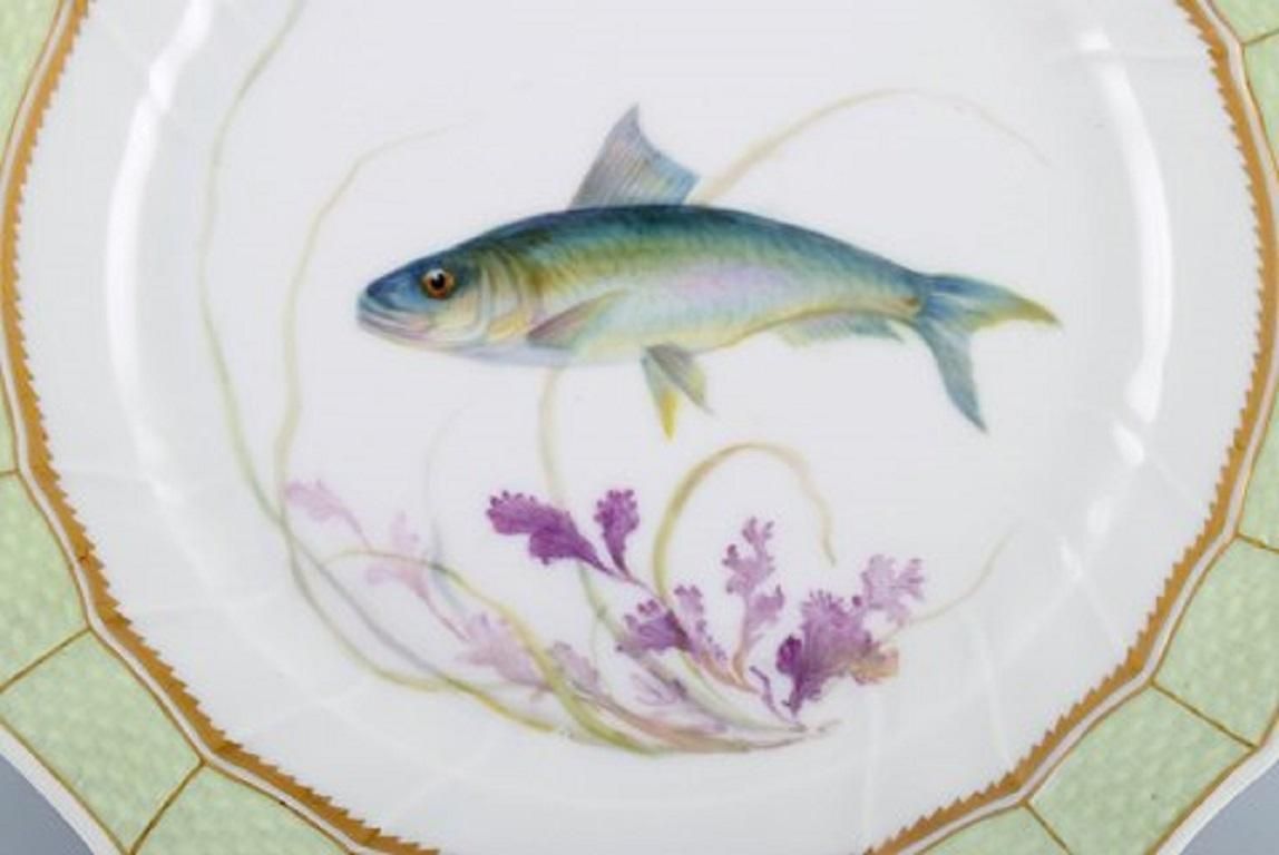 Royal Copenhagen Fish Plate With Green Edge, Gold Decoration And Fish Motif photo furniture