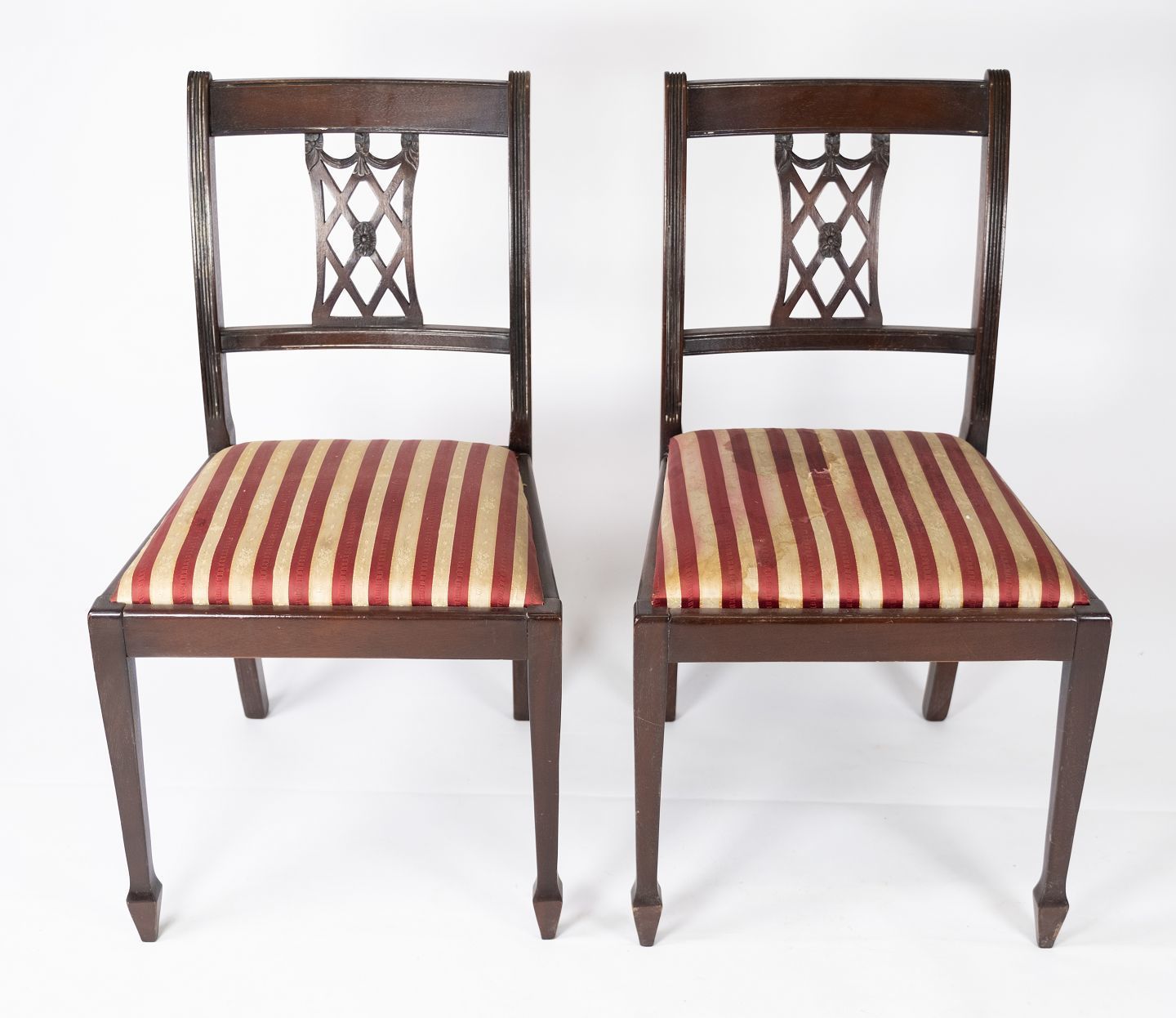 A Set Of 2 Mahogany Dining Chairs And Upholstered With Striped Fabric From The 1960s.