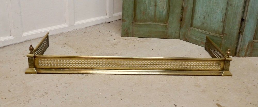 Long Victorian Pierced Brass Fender