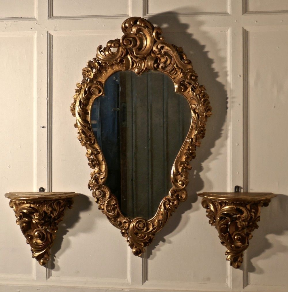 photo for sale Large 19th Century French Rococo Gilt Console Mirror And Wall Brackets Set