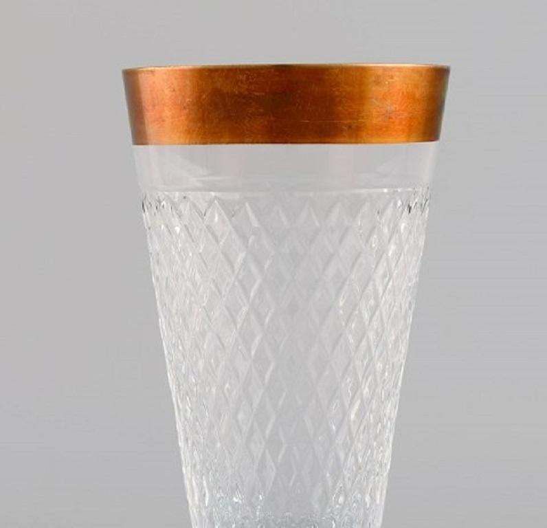 Four Champagne Glasses In Mouth Blown Crystal Glass With Gold Edge, France 1930s photo for sale