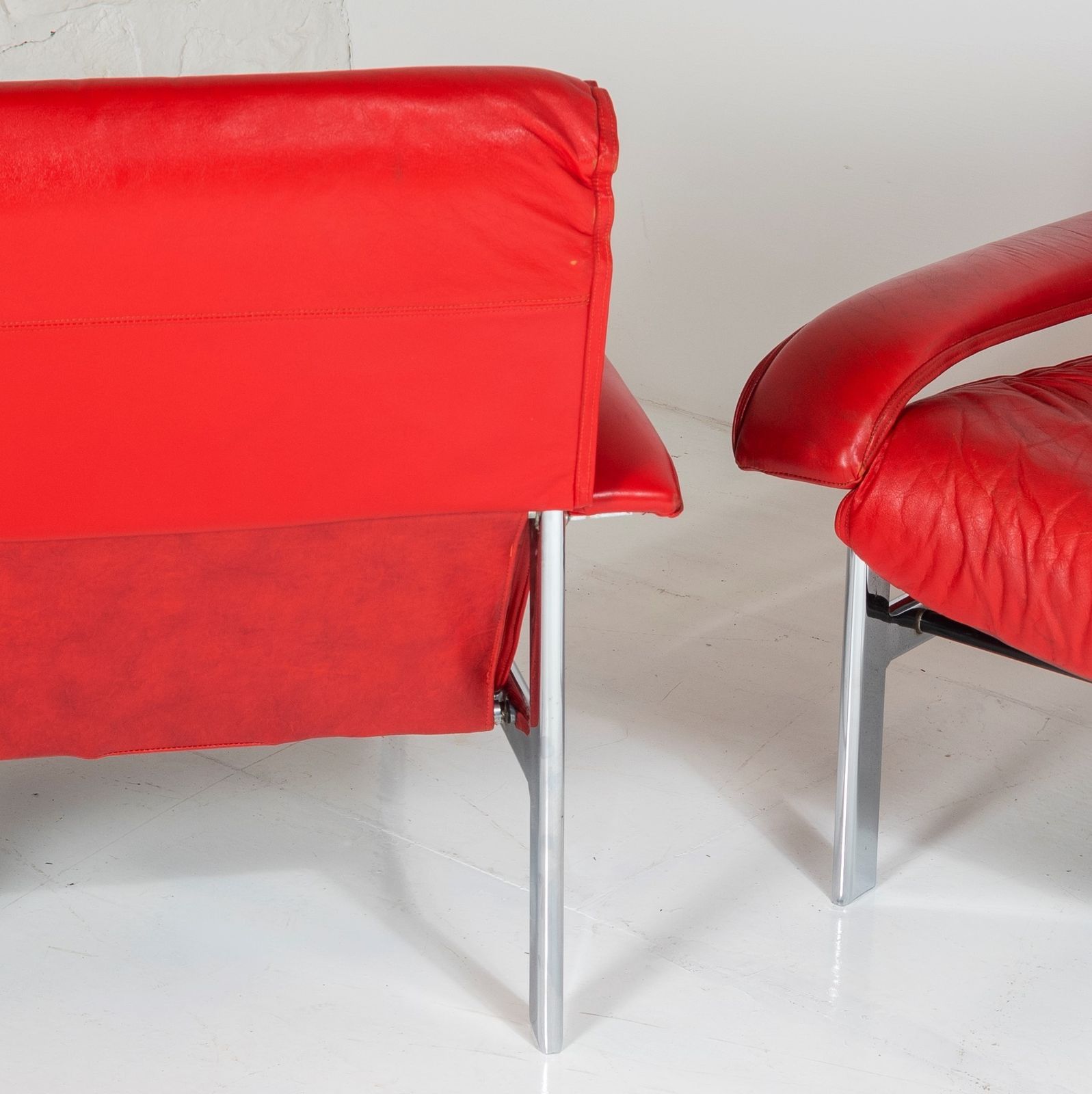 Mid Century Pieff Gamma Red Leather Tubular Chrome Suite Complete With Leather Swivel Chair Set And Leather Armchair Set And Leather Footstool photo vintage