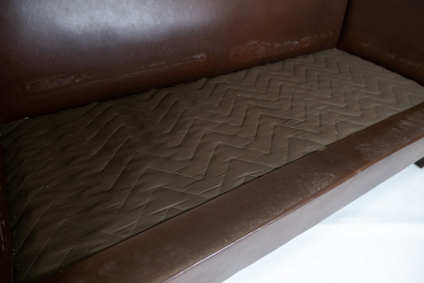 Two Person Sofa Upholstered With Dark Brown Leather Of Danish Design Made By Stouby Møbelfabrik From The 1960s. photo 775.0