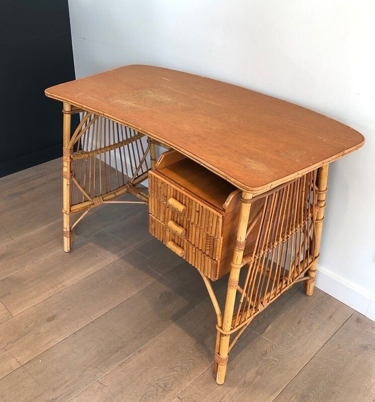 Attributed To Audoux Minet. Rattan Desk With Drawers. French. Circa 1970 photo for sale